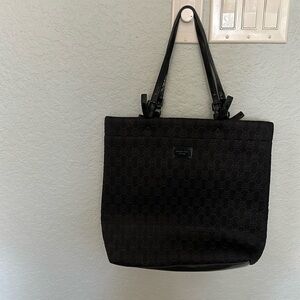Michael Kors black bag.